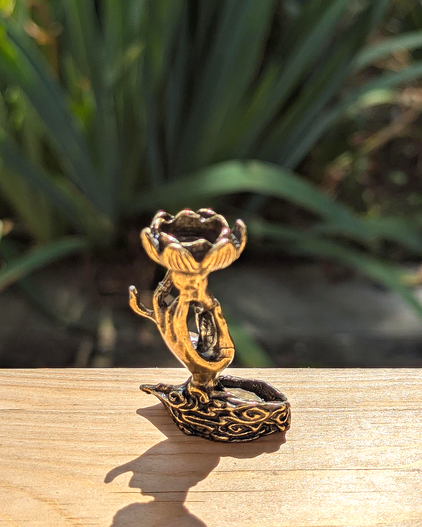 Hand Holding Flower Backflow Incense Holder