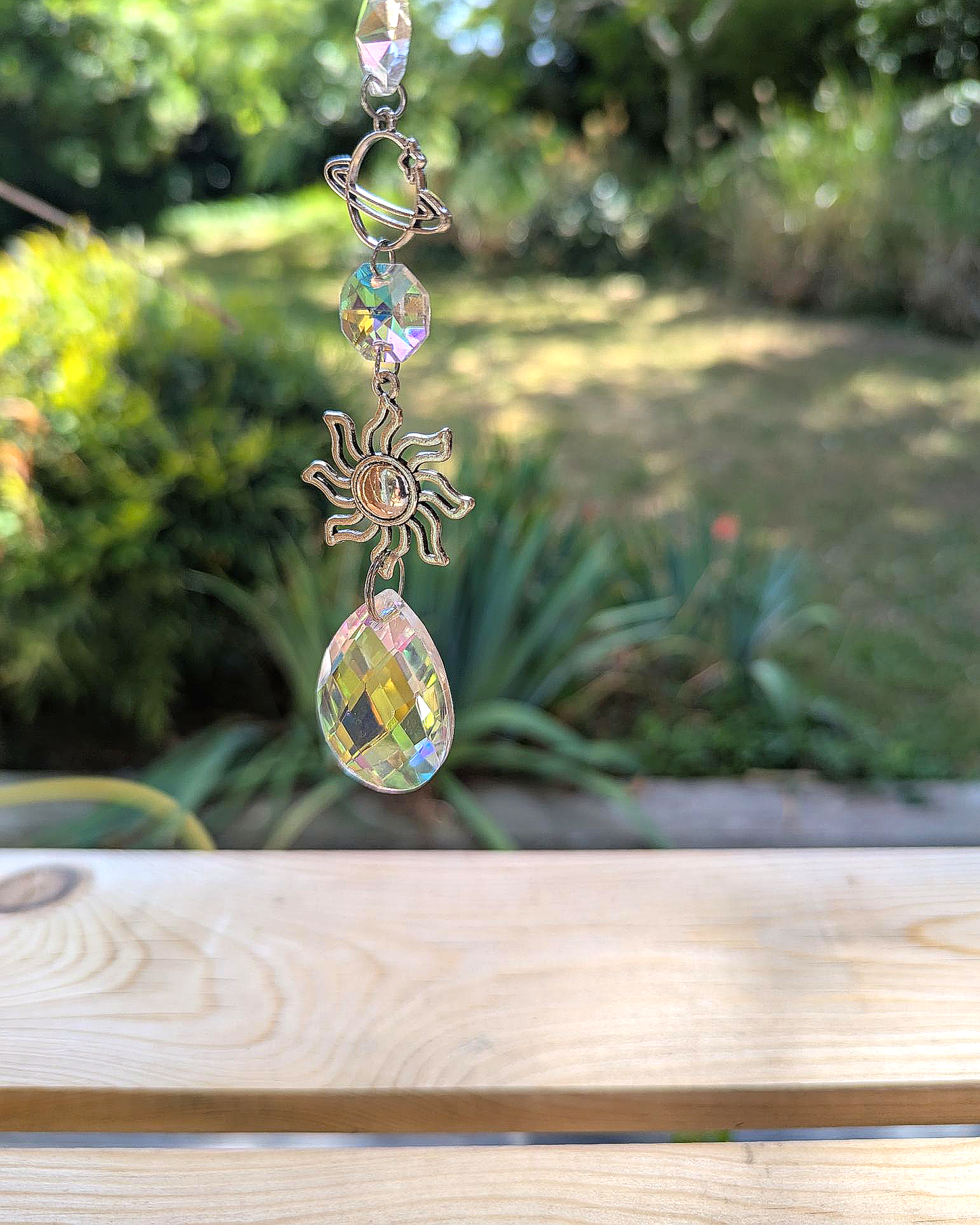 Celestial Crystal Light Catcher with Moon and Sun Charms